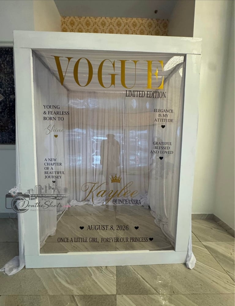 White shadow box display with Vogue magazine cover design featuring gold text and quotes, decorated for a princess-themed celebration dated August 8, 2026